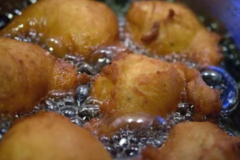 Donuts frying Stock Photos