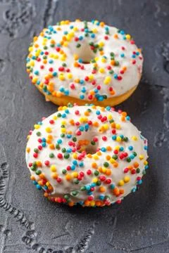 Donuts glazed with various sprinkles Stock Photos