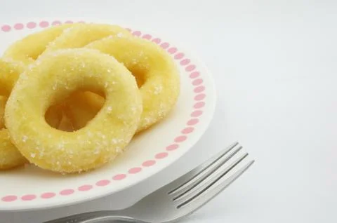 Donuts on a plate with fork Stock Photos