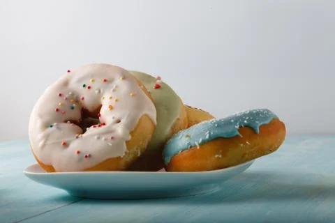 Donuts on saucer Foto stock