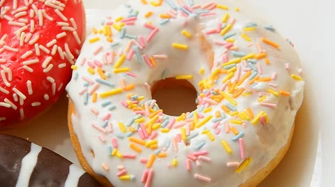 Donuts with sprinkles Video stock 56735886