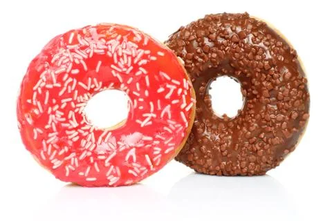Donuts with sprinkles. Stock Photos
