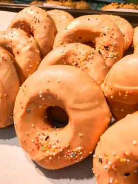Donuts with sprinkles Stock Photos