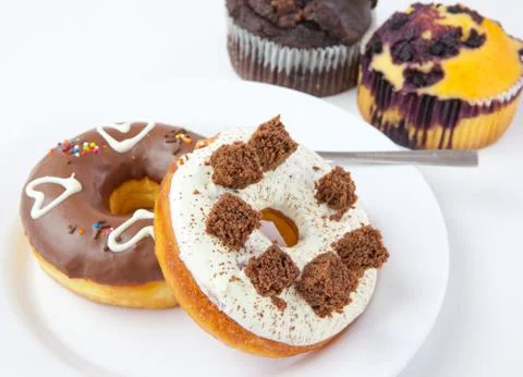 Donuts on the white plate Stock Photos