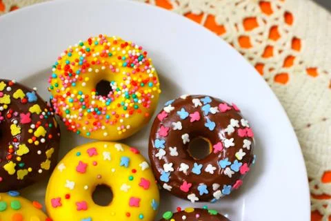 Donuts on a white plate Stock Photos