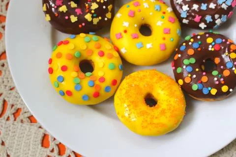 Donuts on a white plate Stock Photos