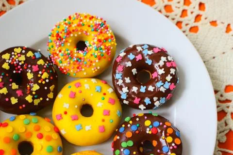 Donuts on a white plate Stock Photos