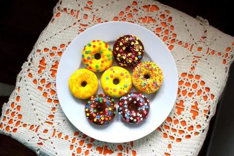 Donuts on a white plate Stock Photos