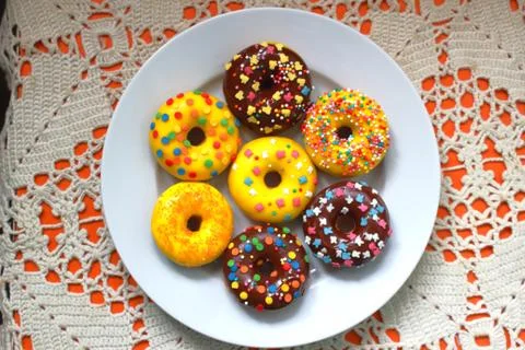 Donuts on a white plate Stock Photos