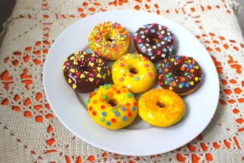 Donuts on a white plate Stock Photos