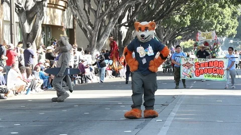 Doo Dah Parade Pair of Furries Slow Motion Stock Footage 98550071