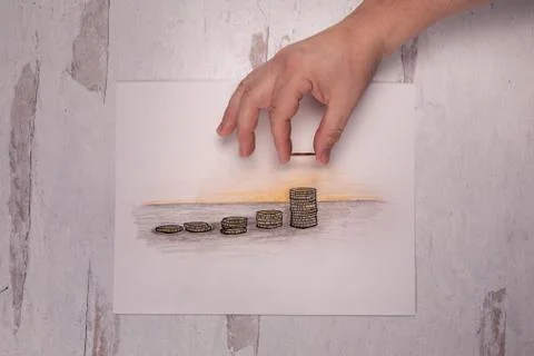 Doodle of stacks of different coin currency with hand placing quarter on stack Stock Photos