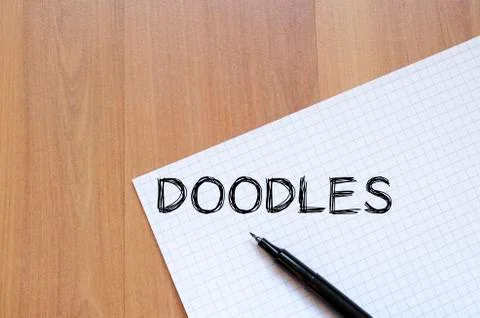 Doodles write on notebook Stock Photos