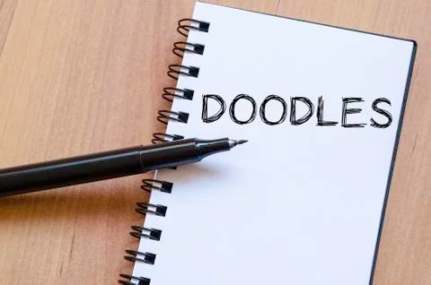 Doodles write on notebook Stock Photos