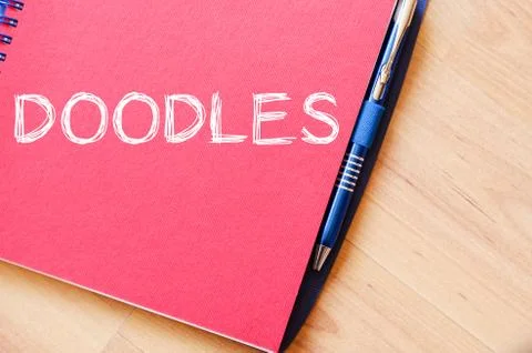 Doodles write on notebook 스톡 사진