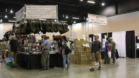 Doomsday Prepper Convention Attendees Looking at Displays Stock Footage 64907193