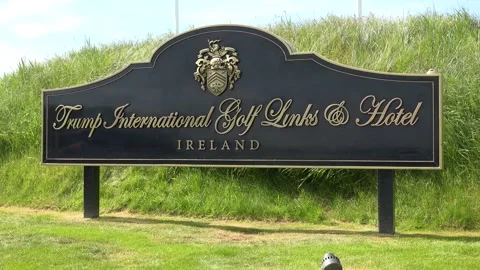 DOONBEG- 8.27.2023 -Close-up of the sign for the Trump International Golf Links Stock Footage 254115082