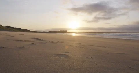 Doonbeg white sand beach, sand is blown by the wind and in the background Stock Footage 267807198