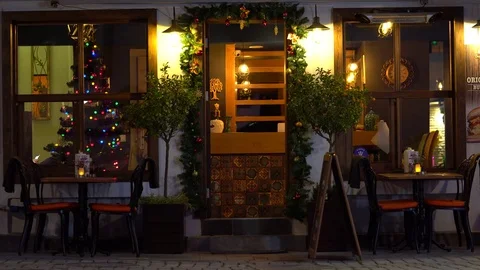 A Door and A Window of a restaurant or cafe  in the christmas evening Stock Footage 83796060