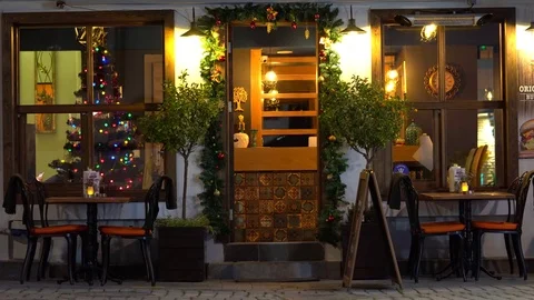 A Door and A Window of a restaurant or cafe  in the christmas evening Stock Footage 83796366