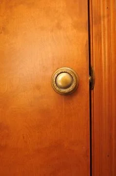 A door background with a shiny surface of brown. Stock Photos