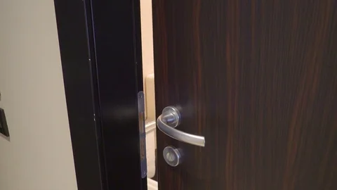 The door of the bathroom opening up Stock Footage 86681989