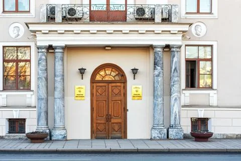 Door between the columns. Stock Photos