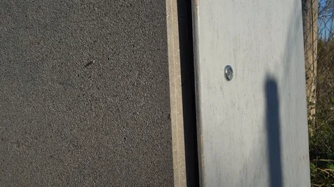 A door with a broken lock opens in the wind Stock-Footage 124173454