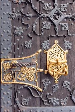 Door decorations. Gold hardware elements. Stock Photos