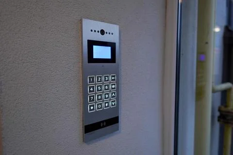 Door Entry System With Keypad Located at an Entrance, Showing Numbers and B.. Stock Photos