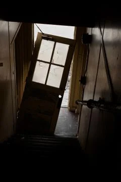 Door Falling off Hinges 库存照片