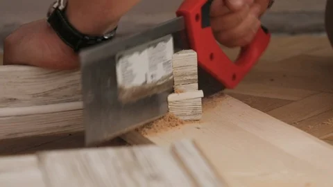 The door frame is being sawn on a slant of 45 degrees Stock Footage 122202209