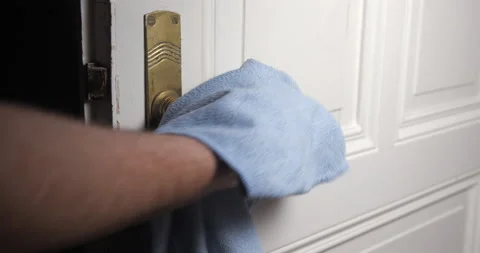 Door handle cleaning with man hand close up Stock Footage 148894876