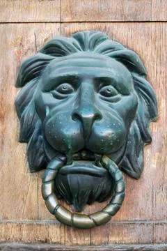 Door handle in the form of a lion&amp;#39;s head Stock Photos