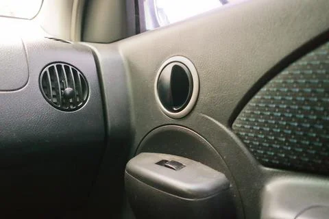 Door handle. hand opens the car door handle. car door. interior door handle.. Photos