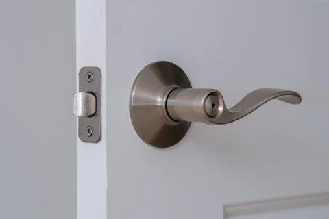 The door handle is installed in the doors Stock Photos