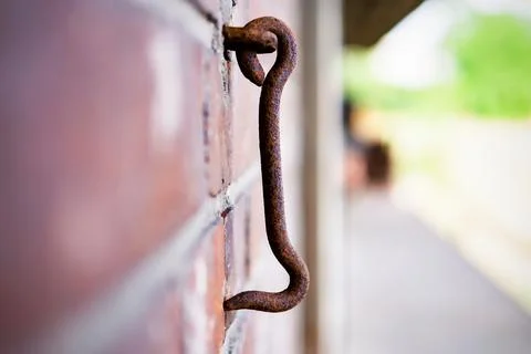 Door hook hanging on a brick wall Stock Photos
