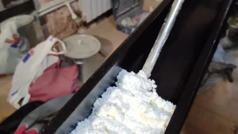 Door installation process. Polyurethane foam is squeezed onto a metal part Stock Footage 145731356