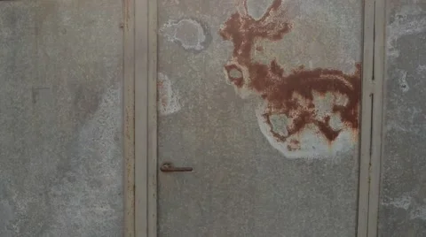 Door in Iron Gate With Elements of Corrosion Closeup Stock Footage 62509199