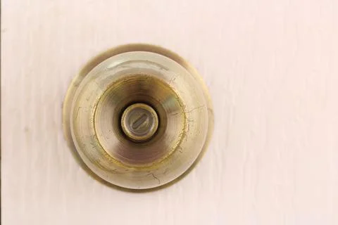 Door knobs on white doors with locks 写真素材