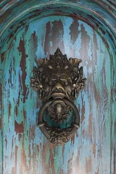 Door knocker with demon face Stock Photos