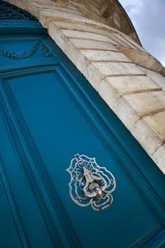 Door knocker on a facade Stock Photos