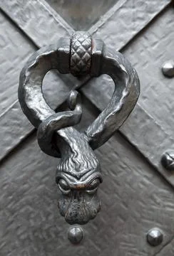 Door knocker in a shape of a snake Stock Photos