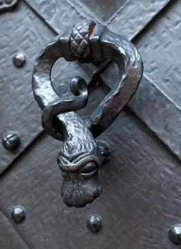 Door knocker in a shape of a snake Stock Photos
