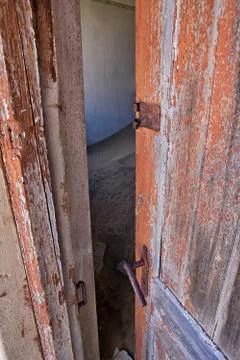 A door in kolmanskop's ghost town namibia Stock Photos
