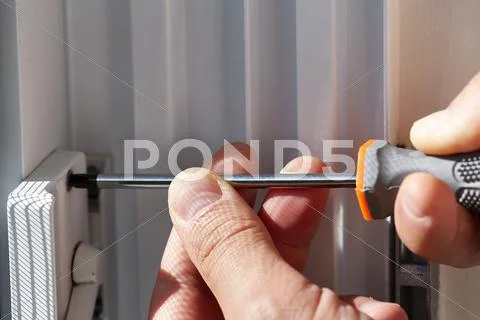 Door lock installation. Stock Photos