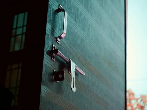 Door lock open with side light sun reflection Stock Photos