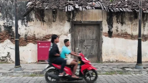 A door in one of the neglected corners of old Chinatown of Lasem Stock Footage 306945886