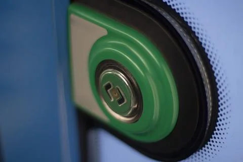 Door open button. Green button on the bus. Bus door control. Stock Photos