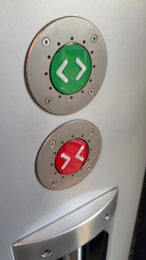 Door open buttons in modern railjet train Stock Footage 311732694